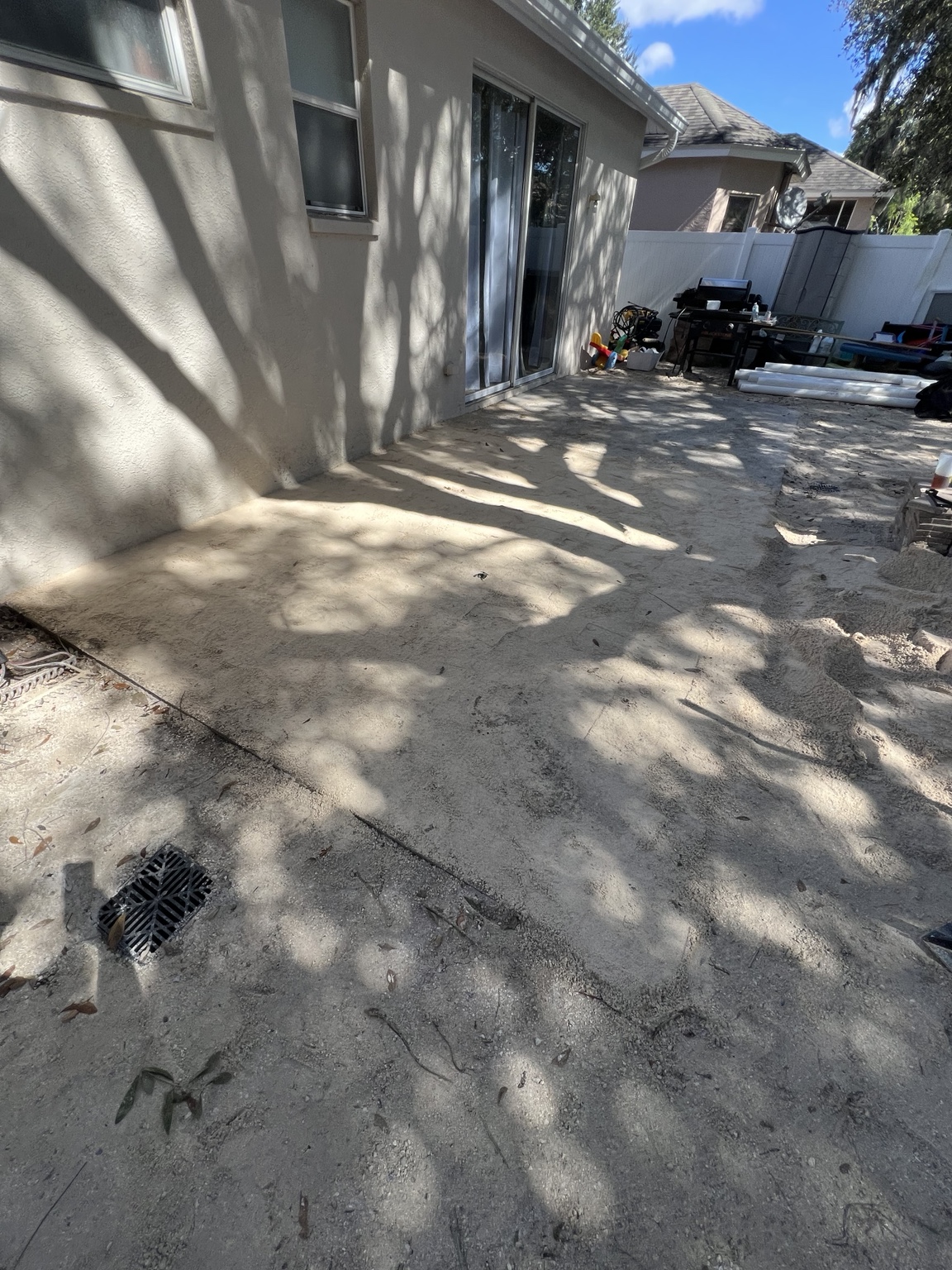 Site preparation beside the house and patio