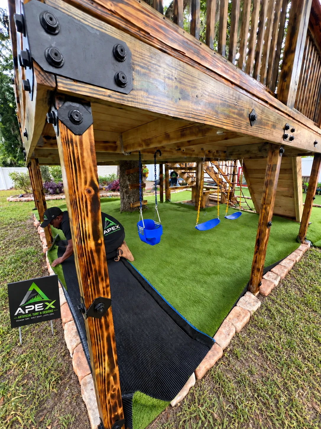 Installation detail under a wood play structure